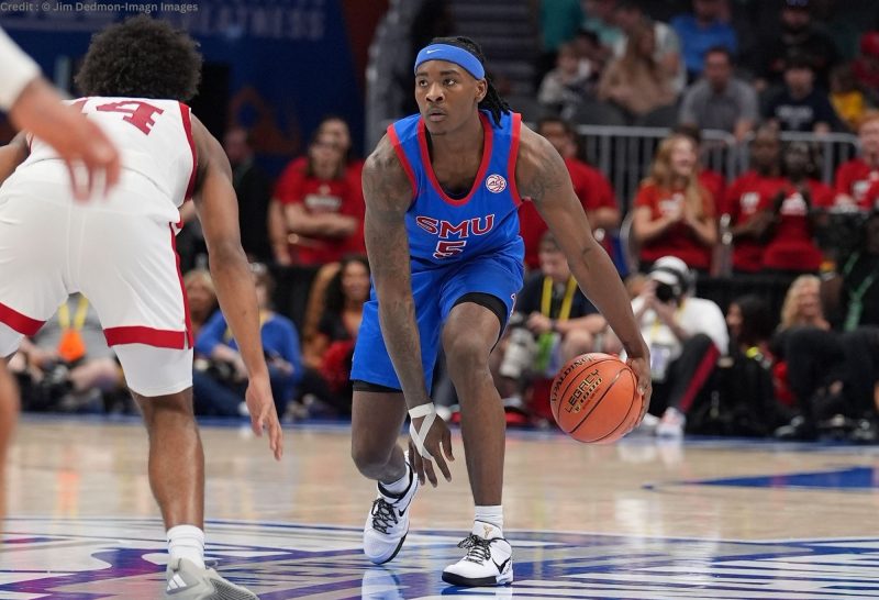 Mar 11, 2026; Charlotte, NC, USA; Southern Methodist University Mustangs guard Jaron Pierre Jr. (5) dribbles during the second half against the Louisville Cardinals at Spectrum Center