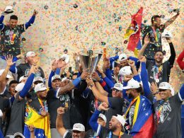 Mar 17, 2026; Miami, FL, United States; Venezuela reacts on the stage after defeating the United States during the 2026 World Baseball Classic Championship game at loanDepot Park. Mandatory